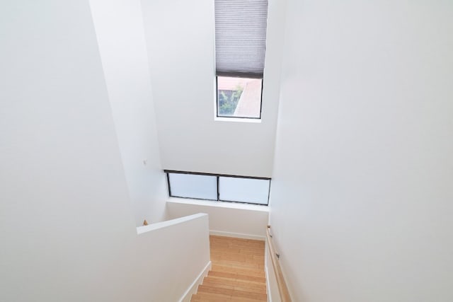 5912 Toscana Ave, Austin, TX 78724 - stairs featuring wood finished floors and baseboards