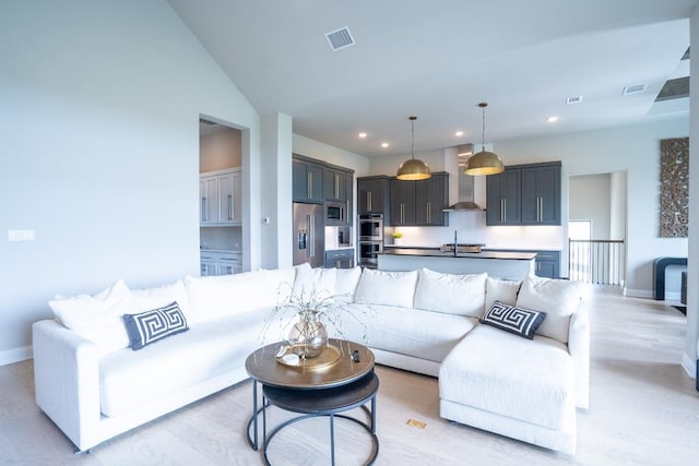 2220 Normandy Vw, Leander, TX 78641 - living area with recessed lighting and light wood-style flooring