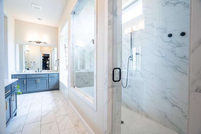 2220 Normandy Vw, Leander, TX 78641 - full bath featuring marble look tiles, vanity, and a marble finish shower