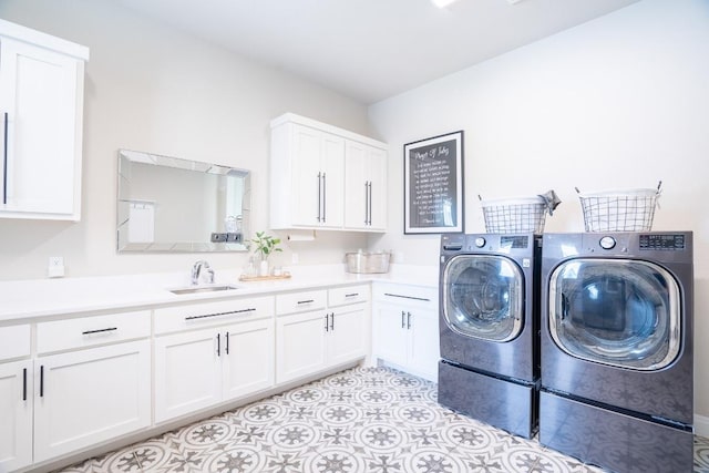 2220 Normandy Vw, Leander, TX 78641 - laundry area with washing machine and dryer and cabinet space
