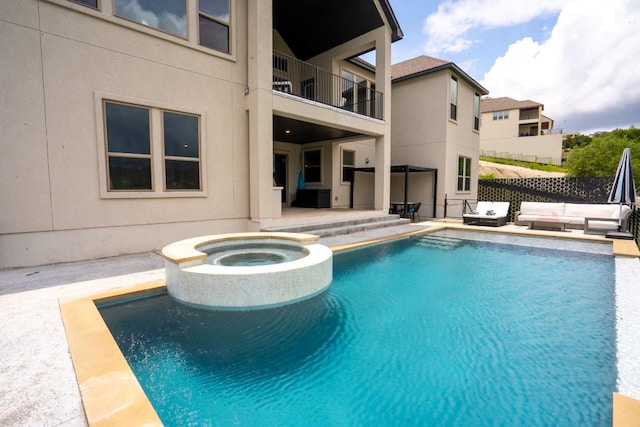 2220 Normandy Vw, Leander, TX 78641 - view of swimming pool featuring a patio, an outdoor hangout area, and a pool with connected hot tub