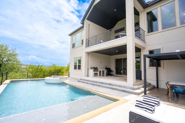 2220 Normandy Vw, Leander, TX 78641 - view of swimming pool with a patio area, a pool with connected hot tub, and grilling area