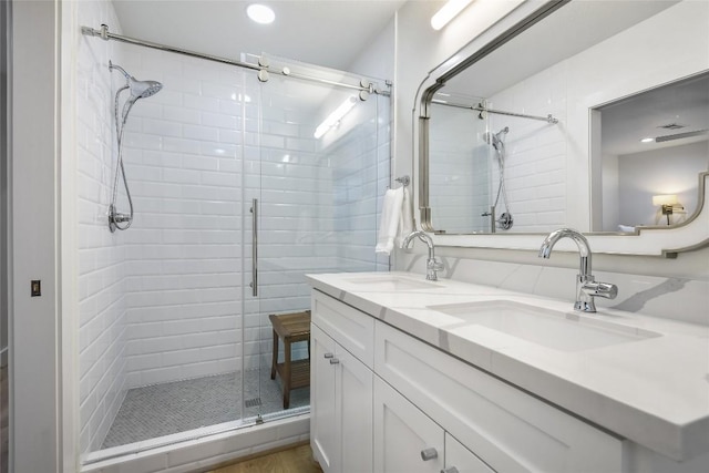 6569 Cutoff Rd, Round Top, TX 78940 - full bath featuring a stall shower, double vanity, and recessed lighting