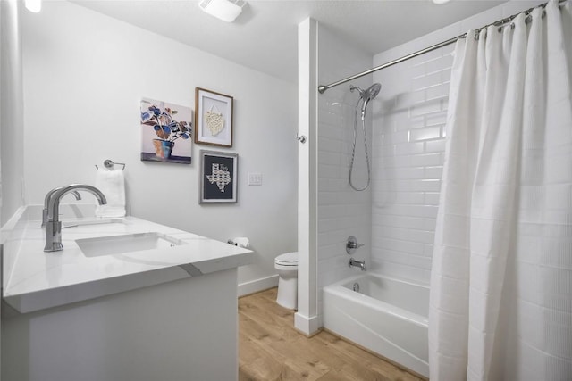 6569 Cutoff Rd, Round Top, TX 78940 - full bathroom featuring wood finished floors, shower / bath combo, and vanity