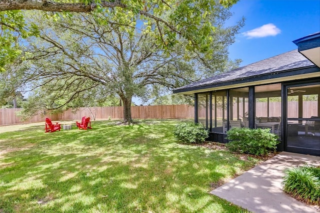 6569 Cutoff Rd, Round Top, TX 78940 - fenced backyard with a sunroom