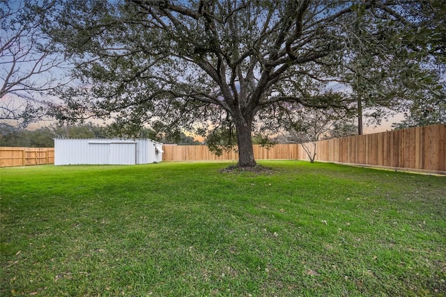 6569 Cutoff Rd, Round Top, TX 78940 - fenced backyard featuring an outbuilding