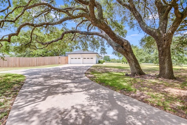 6569 Cutoff Rd, Round Top, TX 78940 - view of front of house with concrete driveway