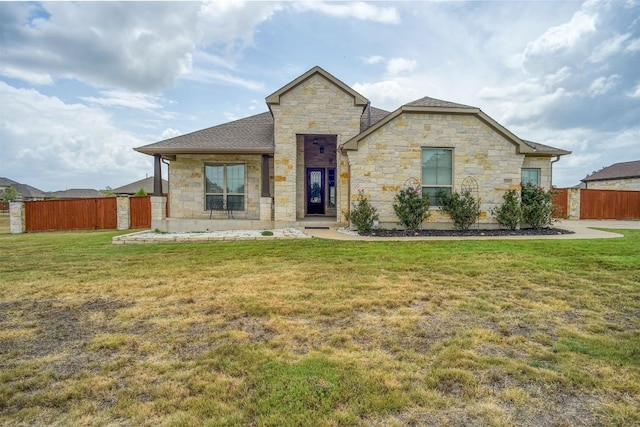 285 Chisholm Trl, Bastrop, TX 78602 - view of front of home with stone siding