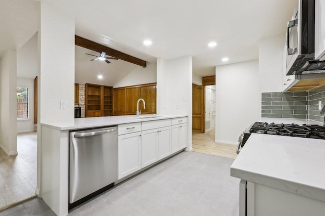 1808 Fawn Ridge Trl, Round Rock, TX 78681 - kitchen featuring appliances with stainless steel finishes, backsplash, white cabinets, recessed lighting, and a ceiling fan