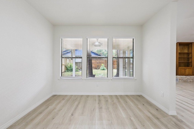 1808 Fawn Ridge Trl, Round Rock, TX 78681 - spare room featuring light wood-style floors and baseboards