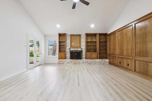 1808 Fawn Ridge Trl, Round Rock, TX 78681 - unfurnished living room featuring light wood-style flooring, a large fireplace, ceiling fan, high vaulted ceiling, and recessed lighting