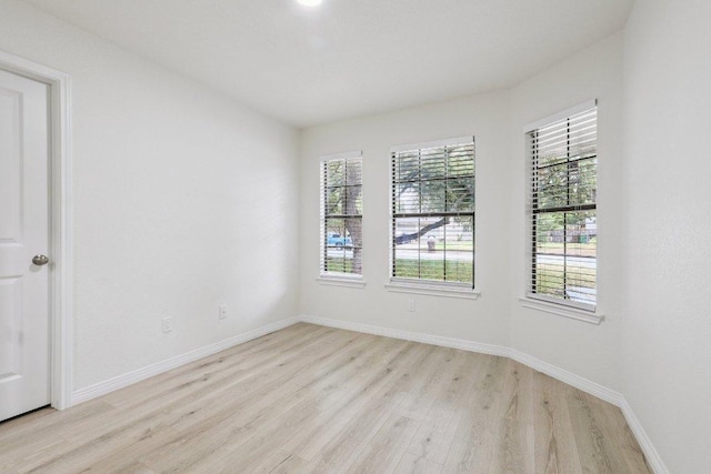 1808 Fawn Ridge Trl, Round Rock, TX 78681 - spare room featuring light wood-type flooring and baseboards