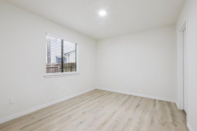 1808 Fawn Ridge Trl, Round Rock, TX 78681 - empty room with light wood-style floors and baseboards