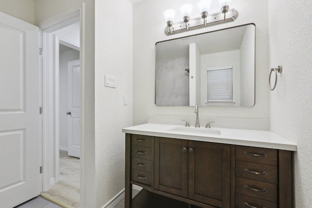 1808 Fawn Ridge Trl, Round Rock, TX 78681 - bathroom featuring vanity and a textured wall