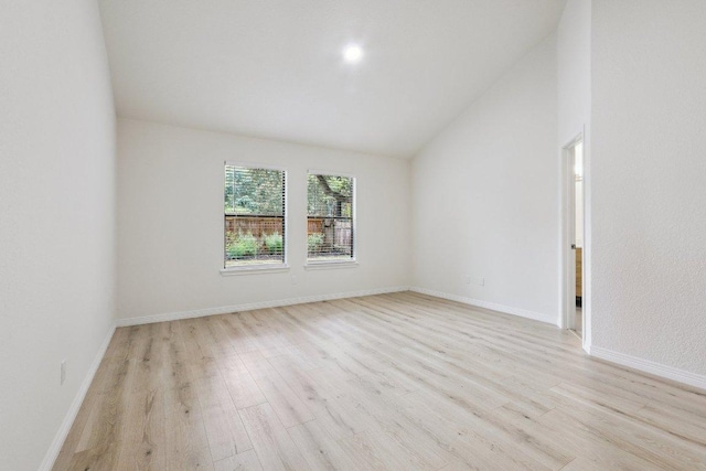 1808 Fawn Ridge Trl, Round Rock, TX 78681 - unfurnished room featuring light wood-style flooring and vaulted ceiling