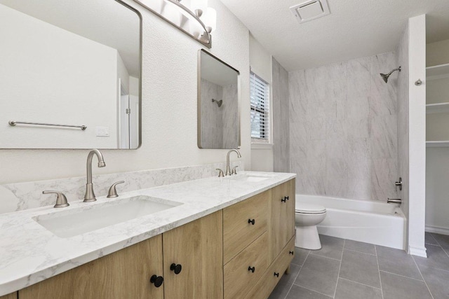1808 Fawn Ridge Trl, Round Rock, TX 78681 - bathroom with bathing tub / shower combination, double vanity, tile patterned floors, and a textured ceiling