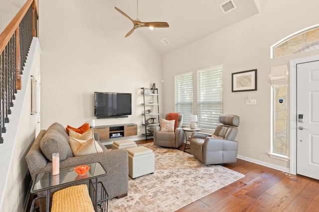 11400 W Parmer Ln Unit 75, Cedar Park, TX 78613 - living room with stairs, high vaulted ceiling, hardwood / wood-style floors, and a ceiling fan