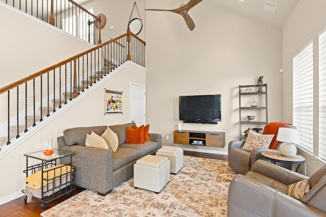 11400 W Parmer Ln Unit 75, Cedar Park, TX 78613 - living room featuring high vaulted ceiling, wood finished floors, stairway, and ceiling fan