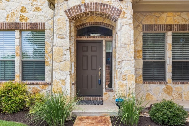 11400 W Parmer Ln Unit 75, Cedar Park, TX 78613 - view of exterior entry featuring stone siding