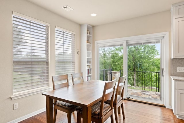 11400 W Parmer Ln Unit 75, Cedar Park, TX 78613 - dining area featuring light wood-style flooring and baseboards