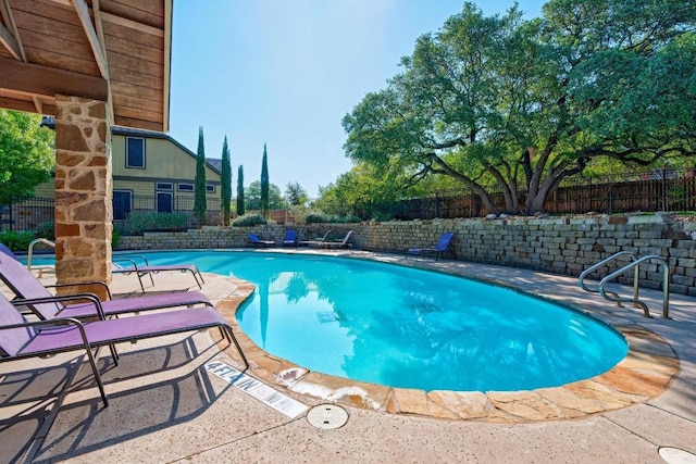 11400 W Parmer Ln Unit 75, Cedar Park, TX 78613 - community pool with a patio area and a fenced backyard