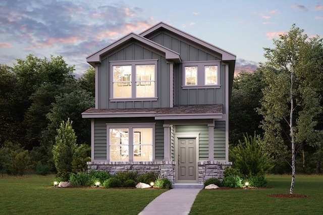 2235 Oscar Eli Way, Round Rock, TX 78665 - craftsman-style house featuring board and batten siding, a front lawn, and stone siding