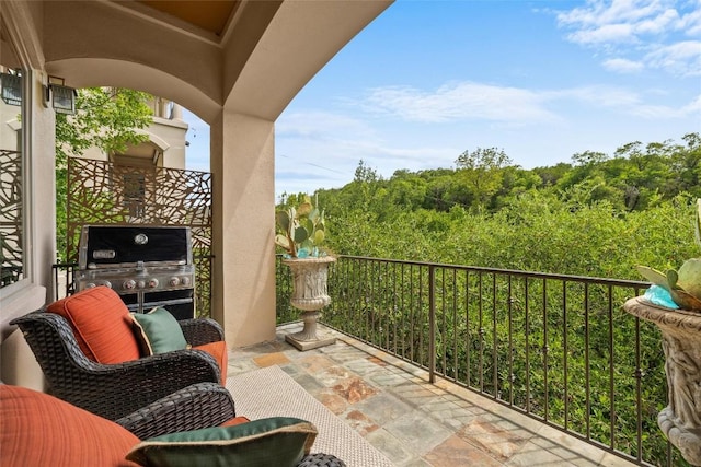 8540 Adirondack Trl Unit 21, Austin, TX 78759 - balcony featuring area for grilling and a wooded view