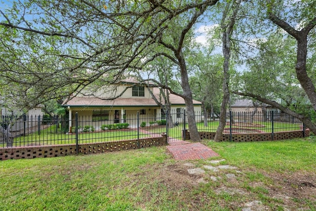 125 Long Wood Ave, Lakeway, TX 78734 - rear view of property with a fenced front yard