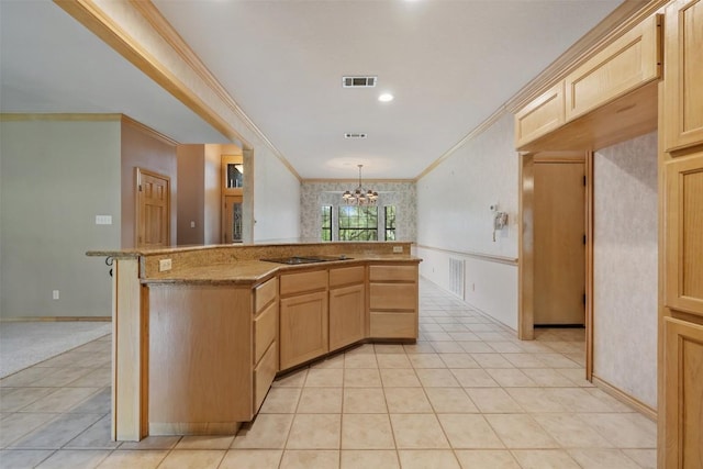 125 Long Wood Ave, Lakeway, TX 78734 - kitchen featuring ornamental molding, light brown cabinets, a chandelier, black electric stovetop, and light tile patterned floors