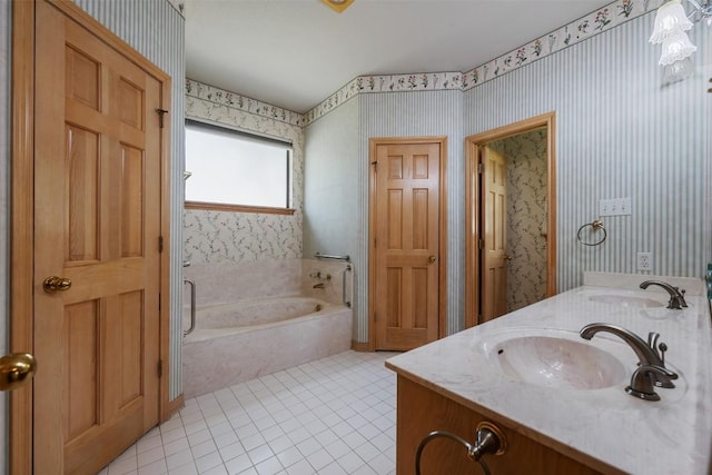125 Long Wood Ave, Lakeway, TX 78734 - bathroom with a garden tub, wallpapered walls, double vanity, and tile patterned flooring