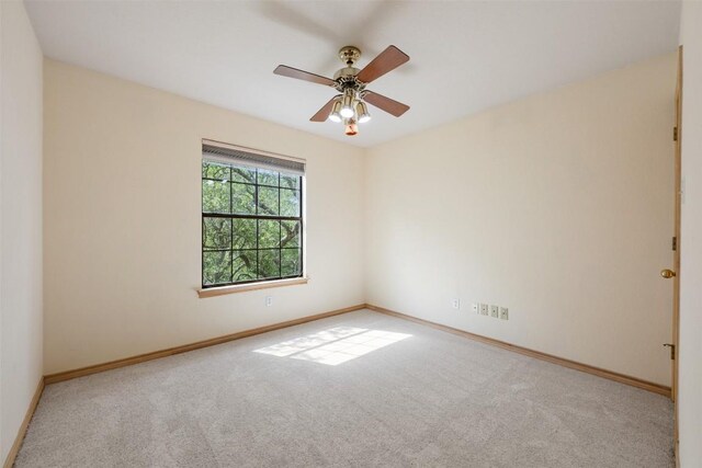 125 Long Wood Ave, Lakeway, TX 78734 - carpeted spare room featuring baseboards and a ceiling fan
