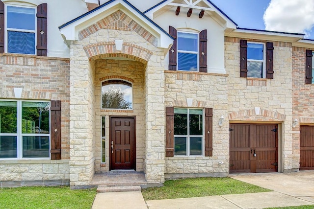 309 Camperdown Elm Dr, Austin, TX 78748 - view of front of property with stone siding, an attached garage, and driveway