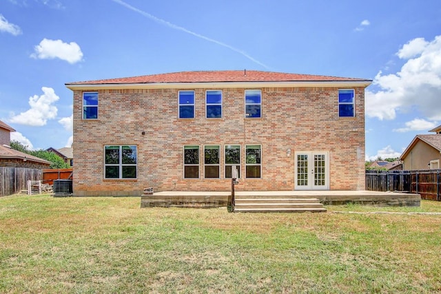 309 Camperdown Elm Dr, Austin, TX 78748 - rear view of property featuring french doors, a patio, a fenced backyard, and brick siding