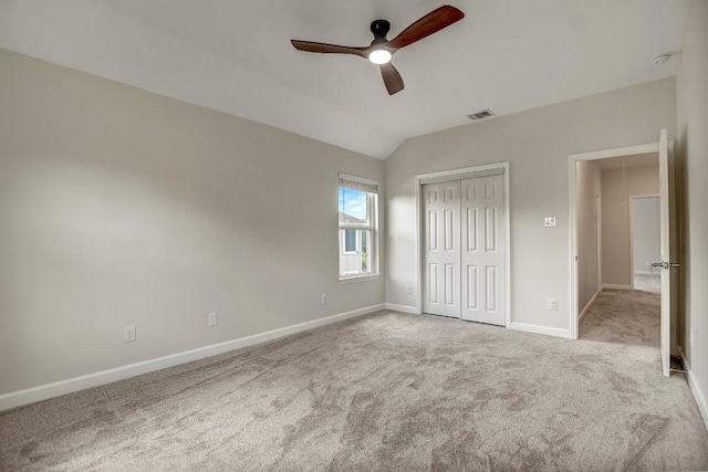 309 Camperdown Elm Dr, Austin, TX 78748 - unfurnished bedroom featuring carpet, a closet, vaulted ceiling, and ceiling fan