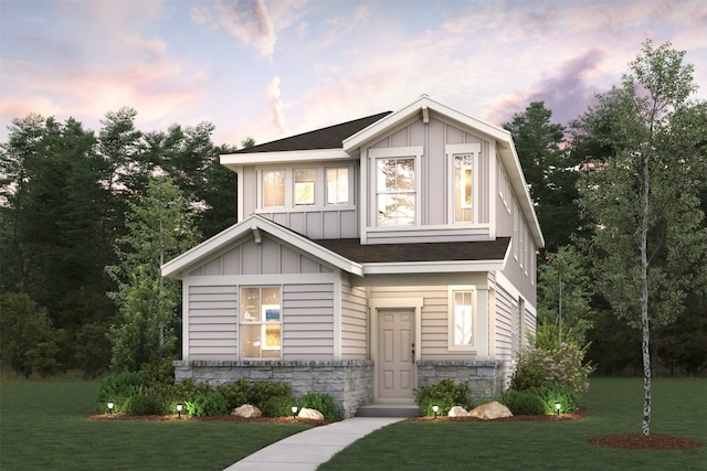 2030 Alice Jay Way, Round Rock, TX 78665 - view of front of house featuring board and batten siding, a yard, stone siding, and a shingled roof
