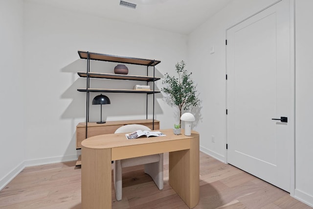 84 E Ave Unit 4004, Austin, TX 78701 - home office with light wood-style floors and baseboards