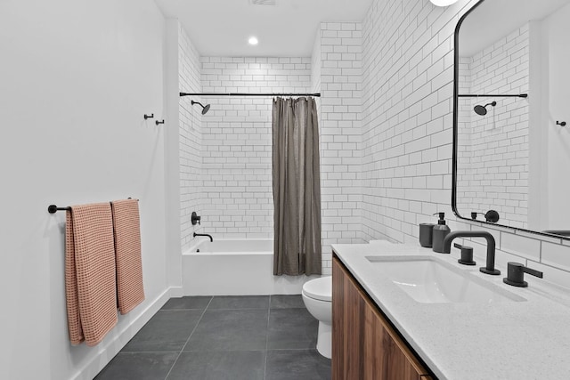 84 E Ave Unit 4004, Austin, TX 78701 - bathroom featuring vanity, shower / bath combo, tile patterned floors, tile walls, and recessed lighting