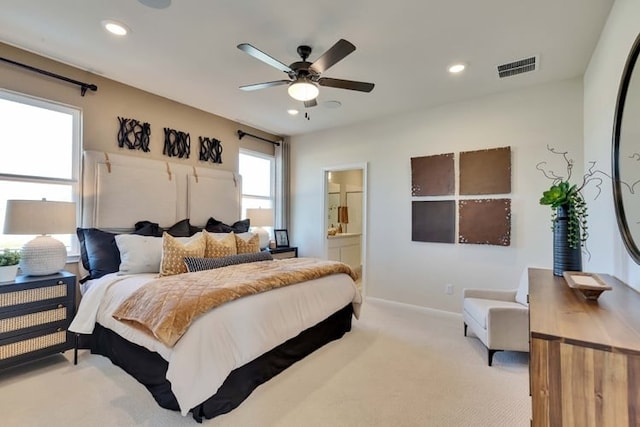 2420 Ekvall Dr, Round Rock, TX 78665 - bedroom featuring light colored carpet, recessed lighting, ensuite bathroom, and a ceiling fan