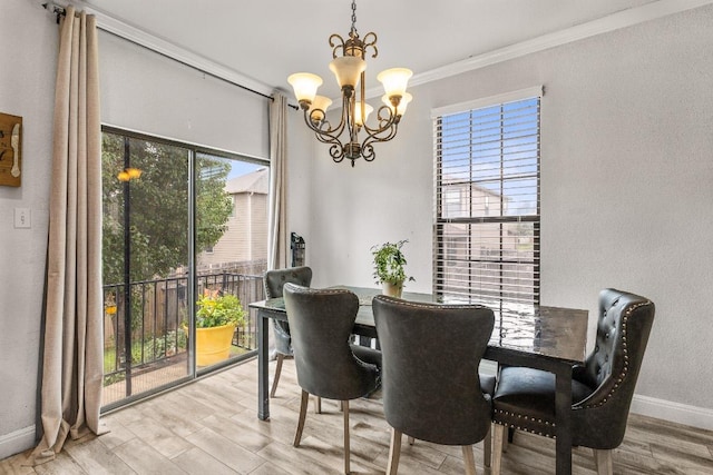 1231 Tumbleweed Trl, Temple, TX 76502 - dining space with a chandelier, ornamental molding, and wood finished floors