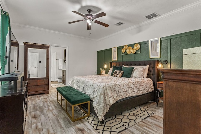 1231 Tumbleweed Trl, Temple, TX 76502 - bedroom featuring ornamental molding, light wood-type flooring, ensuite bath, and ceiling fan
