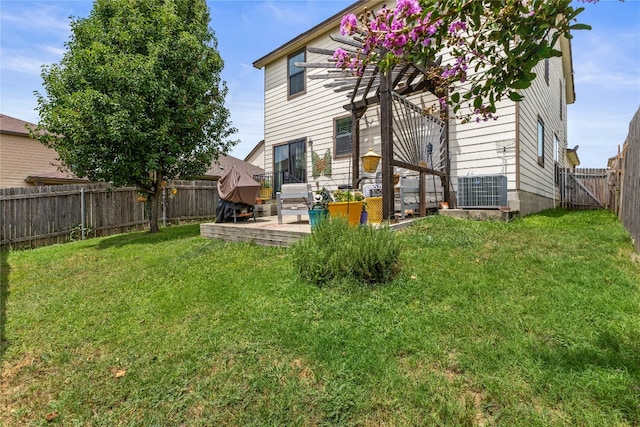 1231 Tumbleweed Trl, Temple, TX 76502 - rear view of house with a fenced backyard and a deck