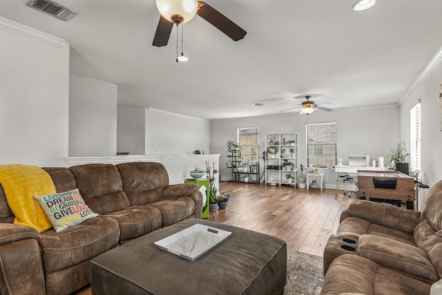 1231 Tumbleweed Trl, Temple, TX 76502 - living area featuring a ceiling fan, ornamental molding, wood-type flooring, and an office area