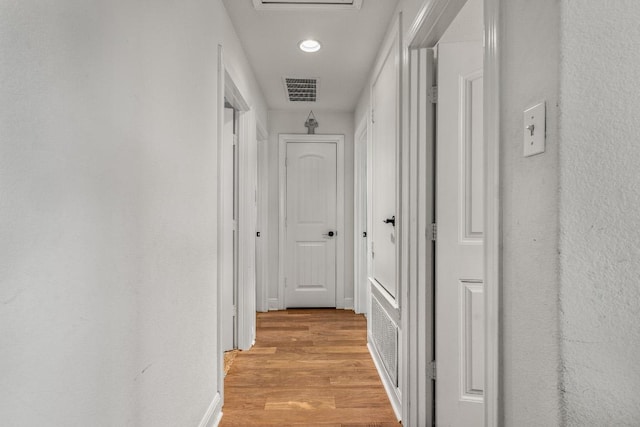 1231 Tumbleweed Trl, Temple, TX 76502 - hallway featuring light wood finished floors and recessed lighting