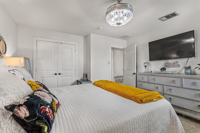1231 Tumbleweed Trl, Temple, TX 76502 - bedroom with a closet and a chandelier