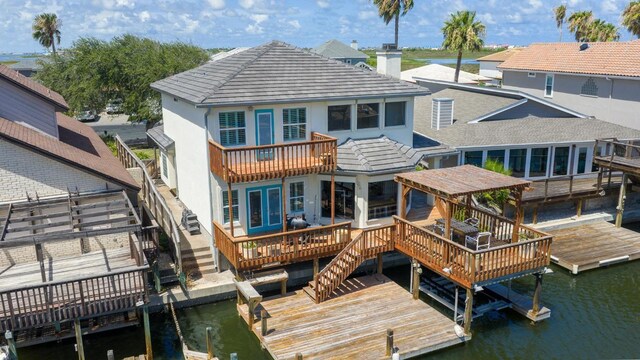13517 Carlos Fifth Ct, Corpus Christi, TX 78418 - back of property featuring stairway, stucco siding, and a deck with water view