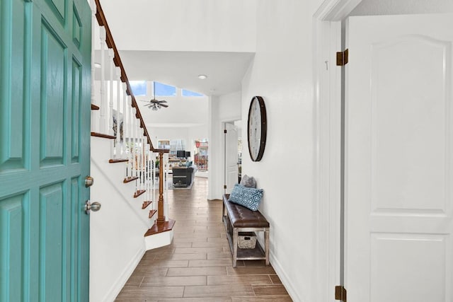 13517 Carlos Fifth Ct, Corpus Christi, TX 78418 - foyer entrance featuring wood finished floors, stairs, and ceiling fan