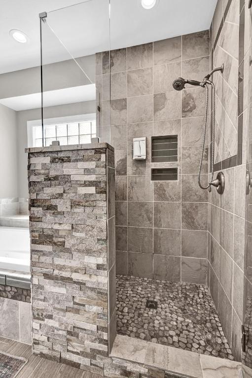 13517 Carlos Fifth Ct, Corpus Christi, TX 78418 - full bathroom featuring a tile shower, recessed lighting, and a tub