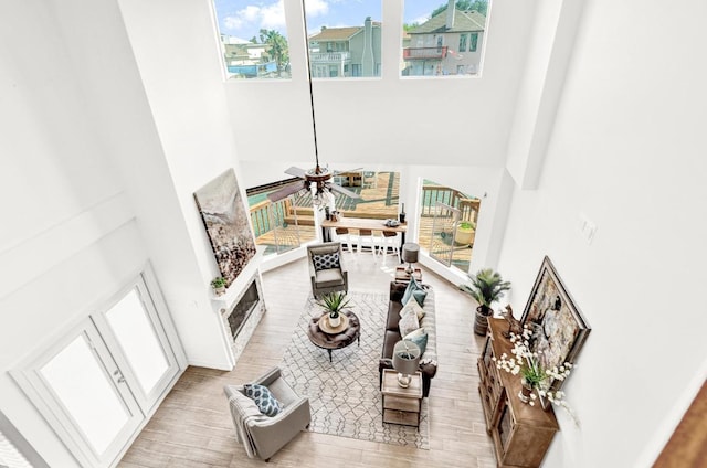 13517 Carlos Fifth Ct, Corpus Christi, TX 78418 - living area featuring a towering ceiling and wood finished floors