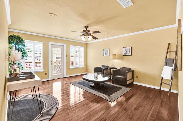 13517 Carlos Fifth Ct, Corpus Christi, TX 78418 - living room with wood finished floors, ceiling fan, and ornamental molding