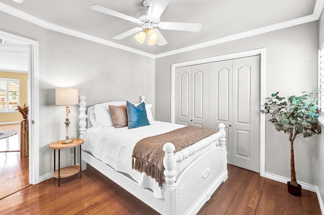 13517 Carlos Fifth Ct, Corpus Christi, TX 78418 - bedroom with a closet, wood finished floors, ornamental molding, and a ceiling fan